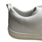 Close-up of a white sneaker on a white background